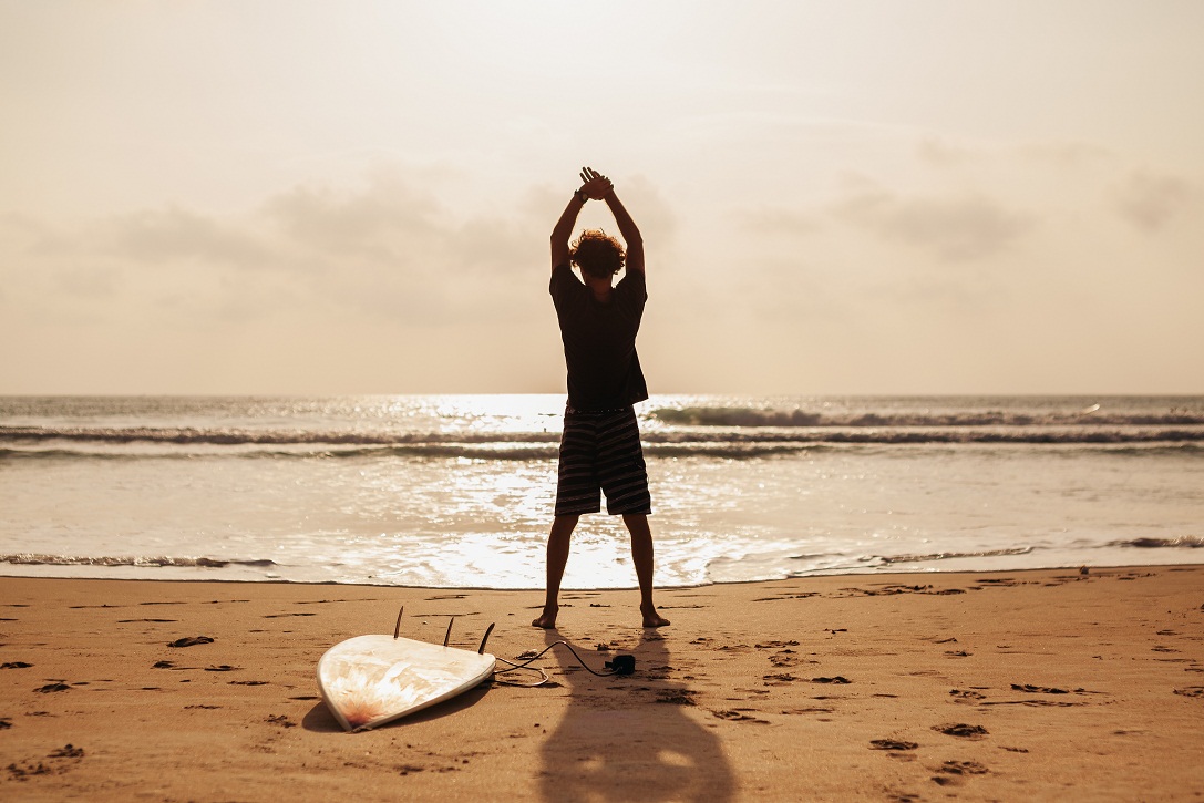 surfer man fitness on the beach